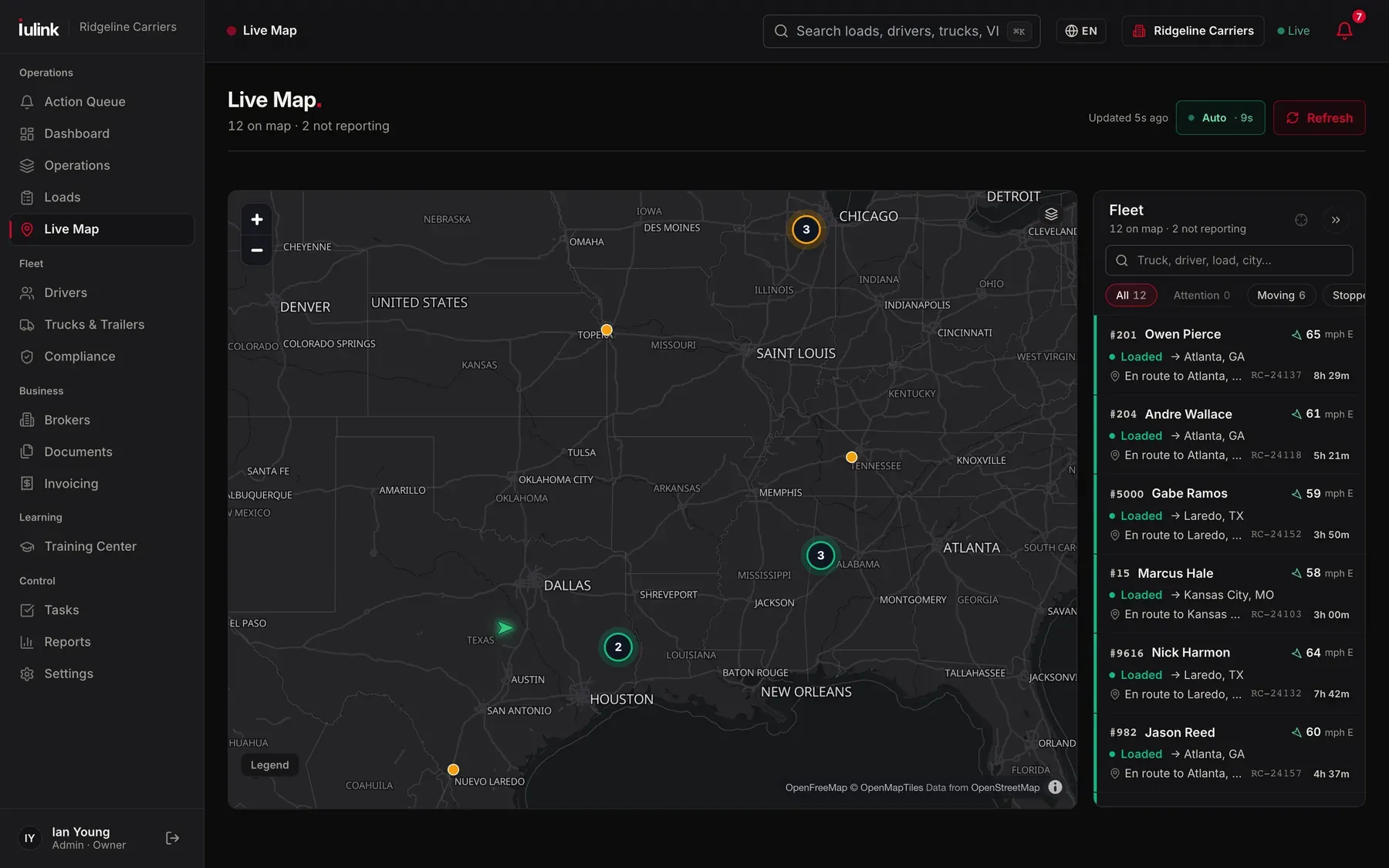 IULink TMS live map: trucks on the map with load, speed and hours of service left (example data)